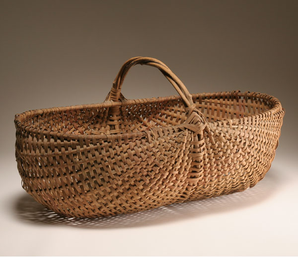 Appraisal: Large hand woven splint gathering basket twig handle Eye of