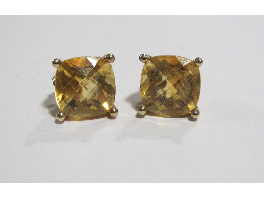 Appraisal: Nine carat gold mounted citrine stud earrings