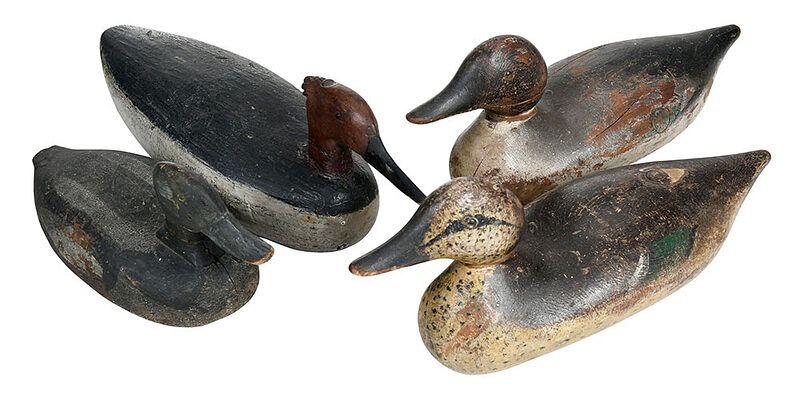 Appraisal: Four Solid Bodied Carved and Painted Decoys American th century