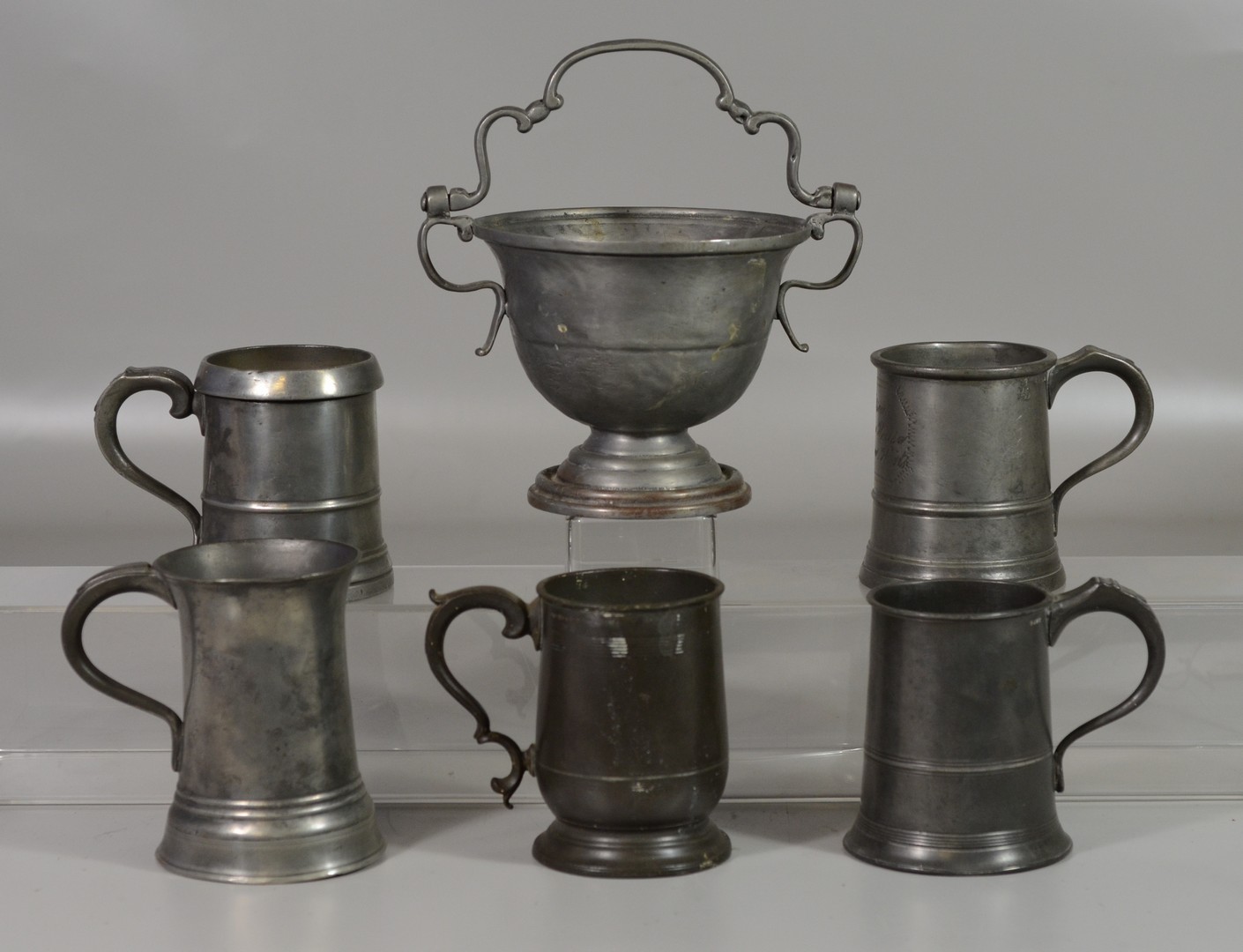 Appraisal: Assorted th C pewter mugs tallest - with a pewter