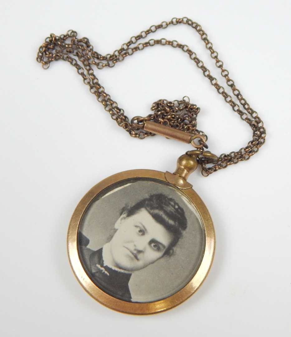 Appraisal: A photographic pendant and chain gilt metal