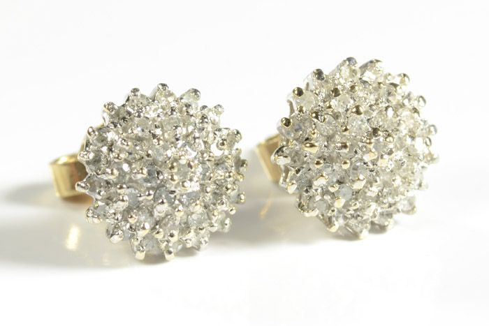 Appraisal: PAIR OF DIAMOND CLUSTER EARRINGS each set with round-cut diamonds