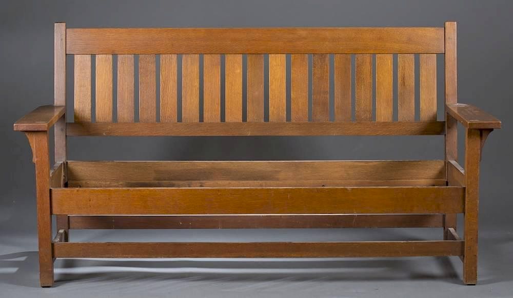 Appraisal: Stickley slat back settle with open arms A Stickley slat