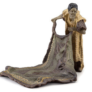 Appraisal: An Austrian Cold-Painted Bronze Figure of a Carpet Seller th