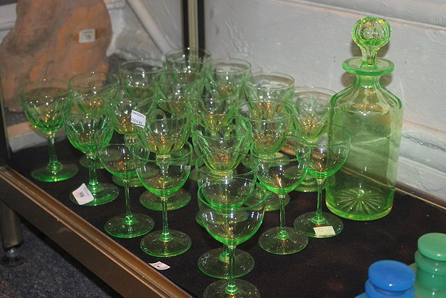 Appraisal: A SET OF FOURTEEN GREEN TINTED WINE GLASSES a similar