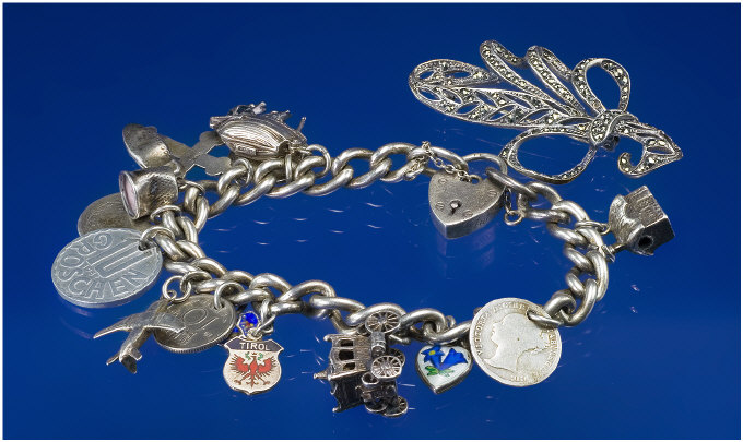 Appraisal: Silver Charm Bracelet Set With Charms Comprising A Sailing Ship