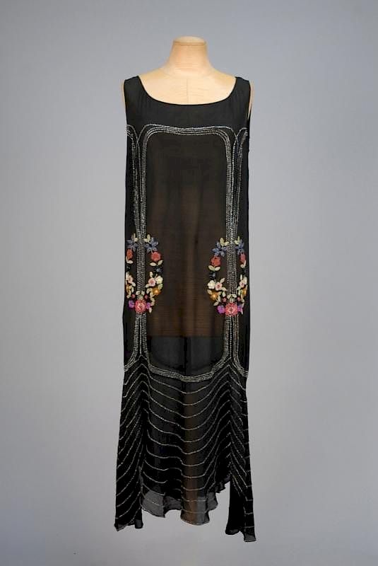 Appraisal: POLYCHROME FLORAL BEADED DRESS s Sleeveless black voile decorated with