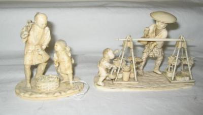 Appraisal: A CARVED IVORY OKIMONO of a father and child tending