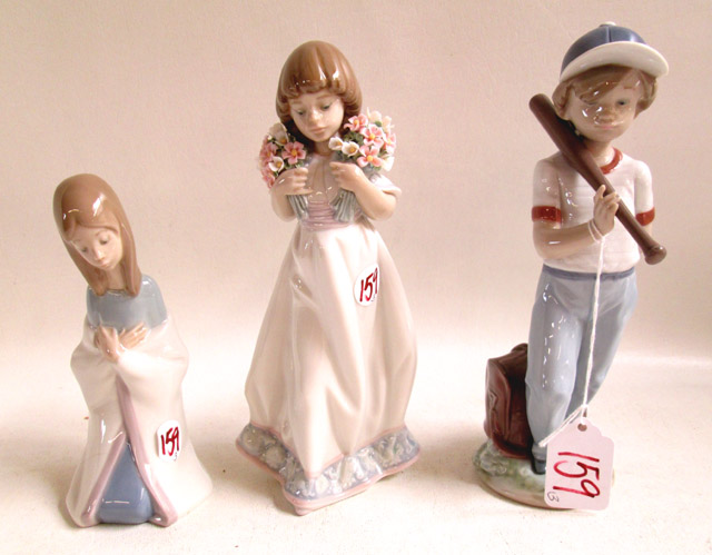 Appraisal: THREE LLADRO FIGURINES soft paste porcelain Spring Bouquets sculptor Juan