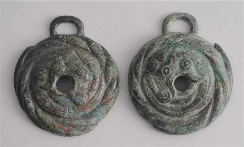 Appraisal: PAIR OF WESTERN ZHOU ARCHAIC BRONZE CHEEK PIECES Each modeled