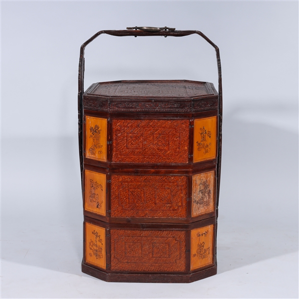 Appraisal: Large and elaborate Chinese wicker and wood stacking basket carved