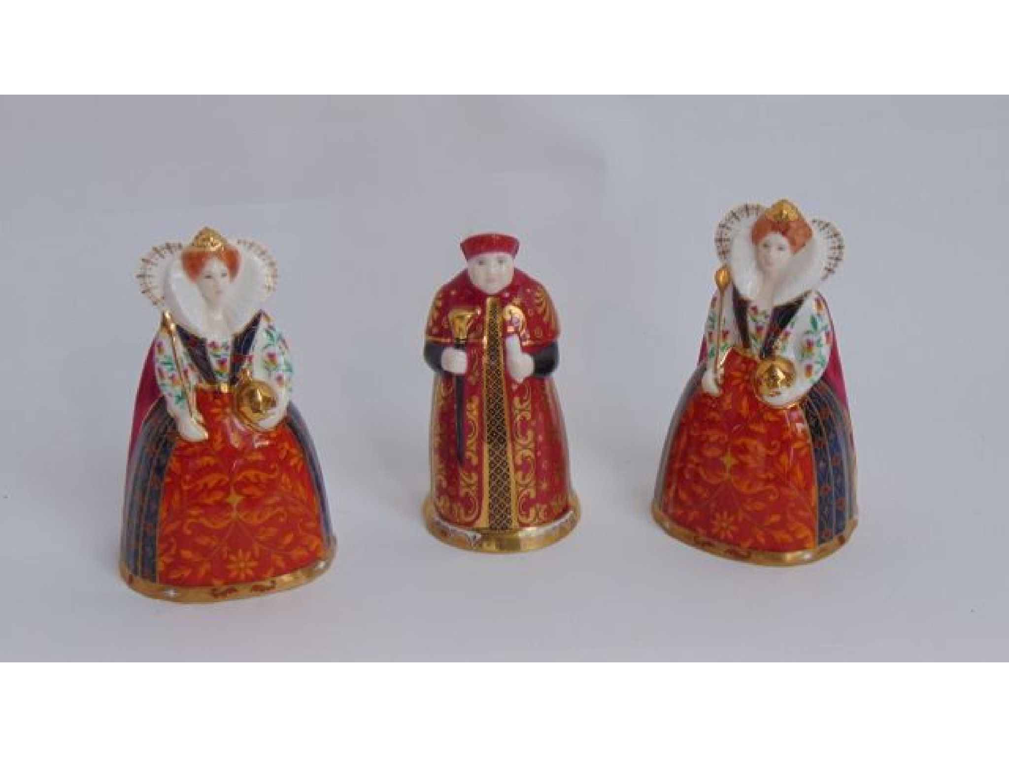 Appraisal: A collection of three Royal Worcester Connoisseur Collection candle snuffers