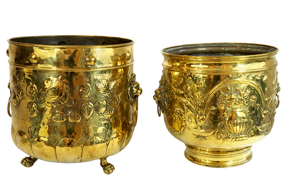 Appraisal: Two English Repousse Jardineres with Lion Handles Lot Two English