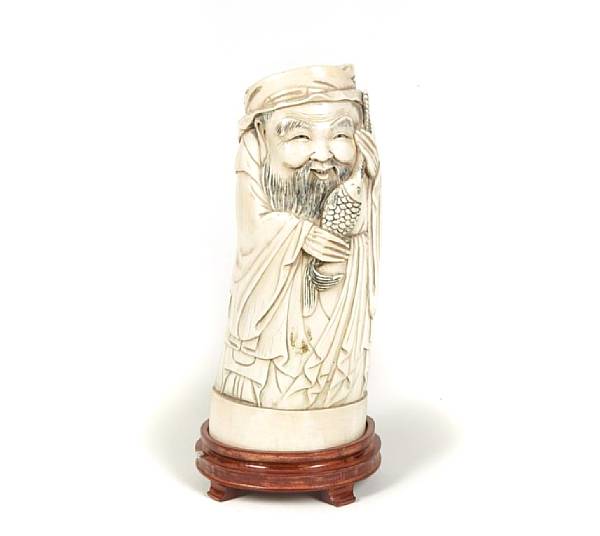 Appraisal: An ivory carved fisherman minor age cracks height in width