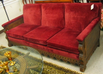 Appraisal: RED VELVET AND CARVED OAK SOFA American c 's having