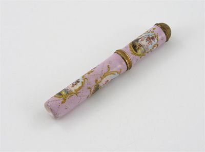 Appraisal: A pink enamel needle case painted with three gilded panels