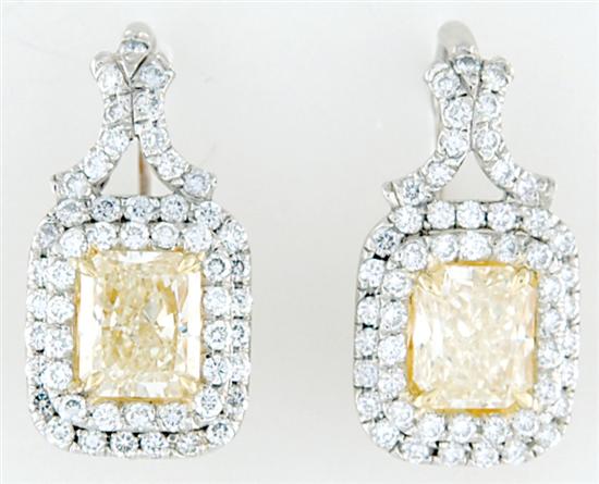 Appraisal: Platinum and fancy yellow diamond earrings two radiant-cut diamonds ctw