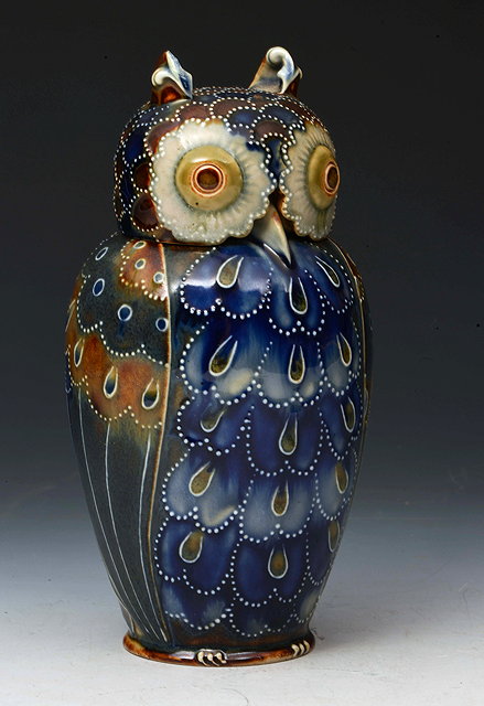 Appraisal: A Doulton Lambeth owl jar and cover probably designed by