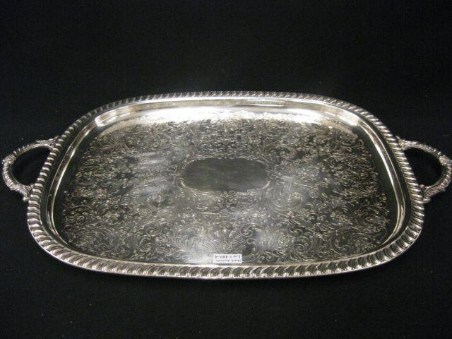 Appraisal: Silverplate Serving Tray fine engraved floral gadroon border handled x