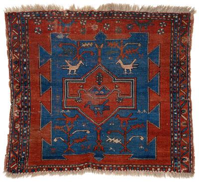 Appraisal: Kazak rug square blue central panel with birds multiple geometric