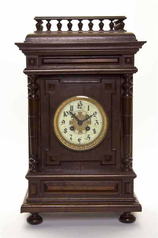 Appraisal: A Continental Walnut Mantel Clock L Charvet Aine Cie the