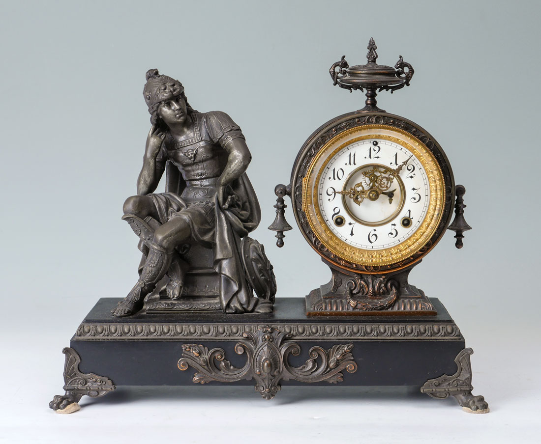 Appraisal: ANSONIA SPELTER IRON FIGURAL MANTLE CLOCK Patinated clock round clock