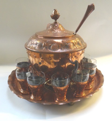 Appraisal: A WMF copper brass plated and glass punch set circa