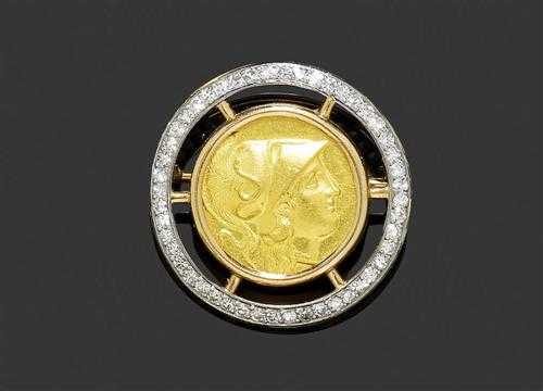 Appraisal: GOLD AND DIAMOND BROOCH ca Platinum and yellow gold Very