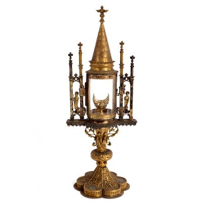 Appraisal: An Iberian gilt-metal monstrance part th Century the cylindrical glass-enclosed