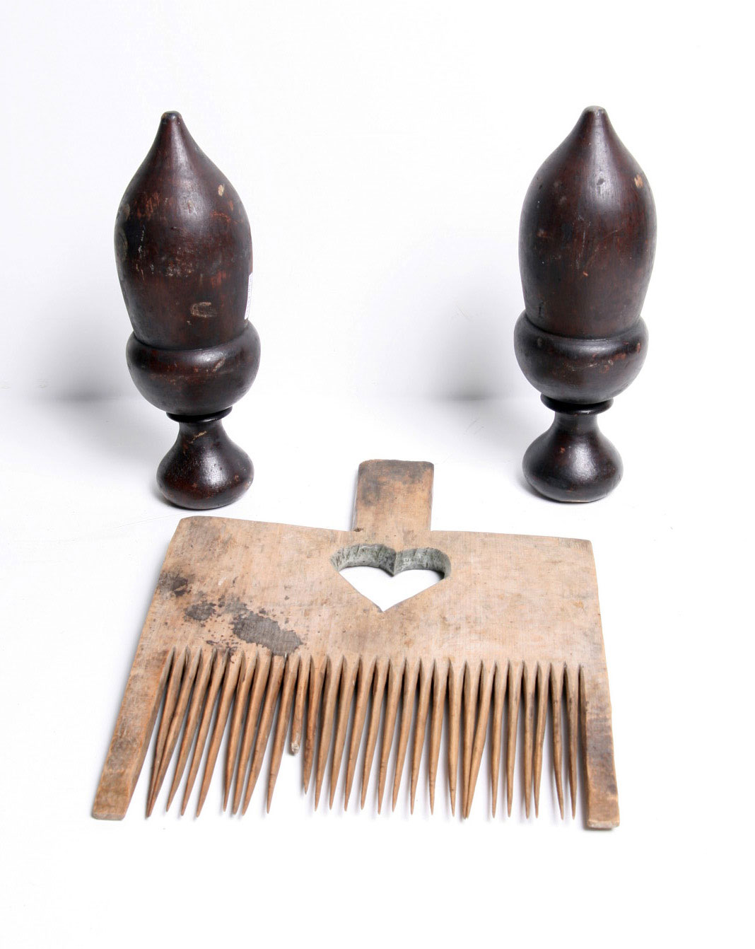 Appraisal: CARVED TEXTILE COMB WITH HEART MOTIF Overall height inches Together