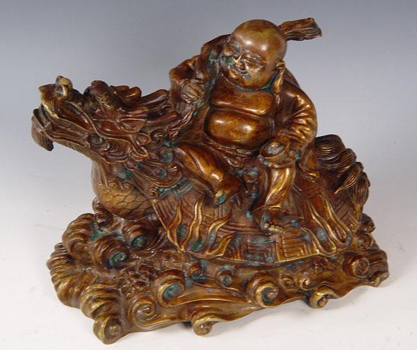 Appraisal: DECORATIVE CHINESE BRONZE BUDDHA ON TURTLE DRAGON Finely detailed contemporary