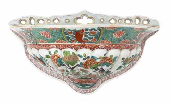 Appraisal: A Chinese Wall Basin of shell form having a pierced