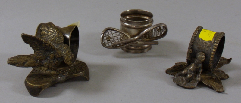 Appraisal: Three Late Victorian Silver Plated Figural Napkin Rings a Manhattan