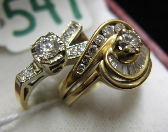 Appraisal: TWO DIAMOND AND FOURTEEN KARAT GOLD RINGS one ring centers