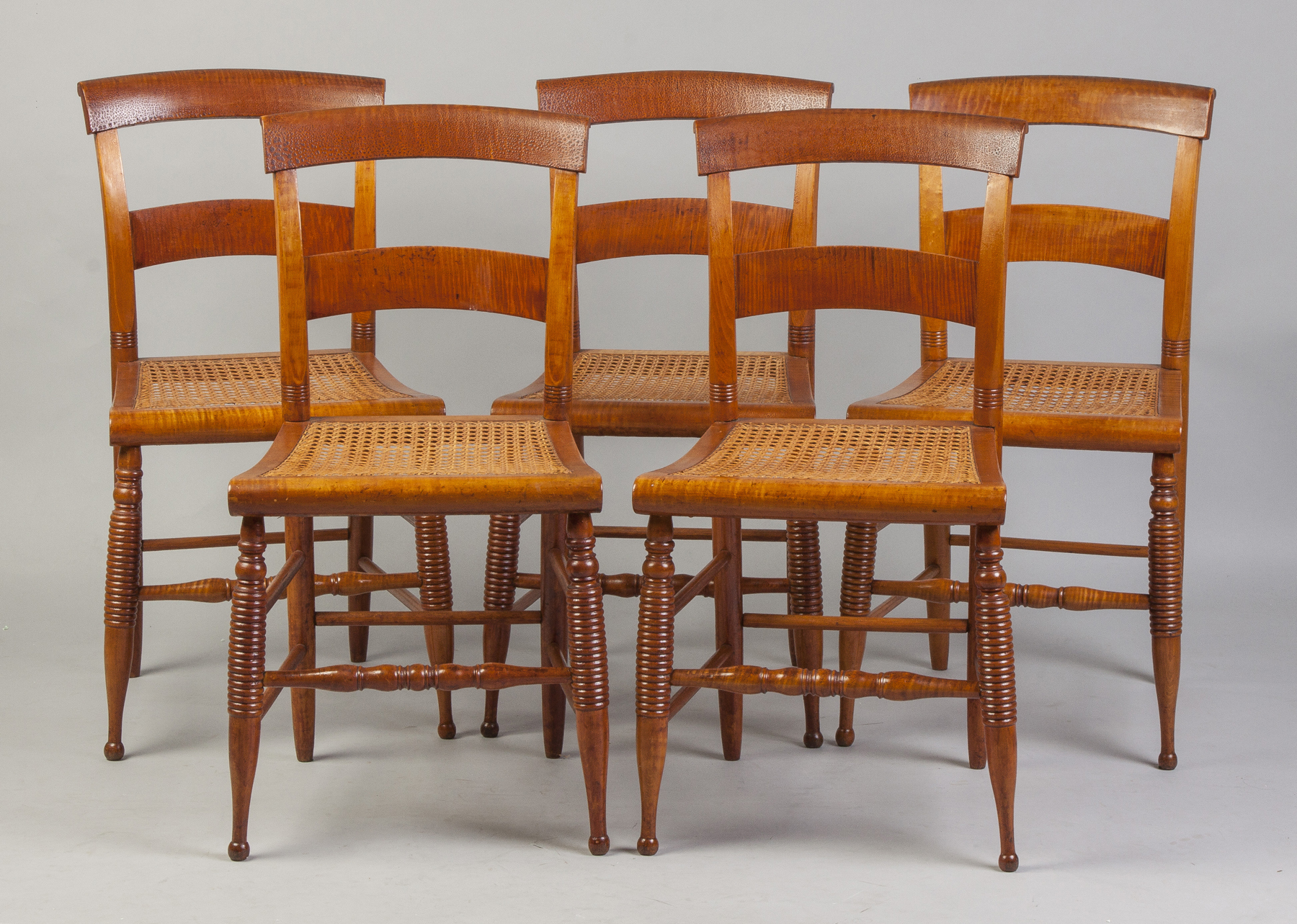 Appraisal: Set of Five Tiger Maple Chairs Early th cent Cane