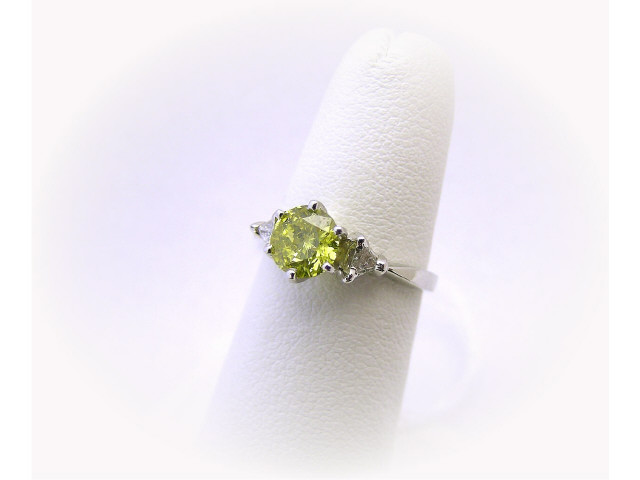 Appraisal: K white gold ct yellow diamond ring ct trillion accent