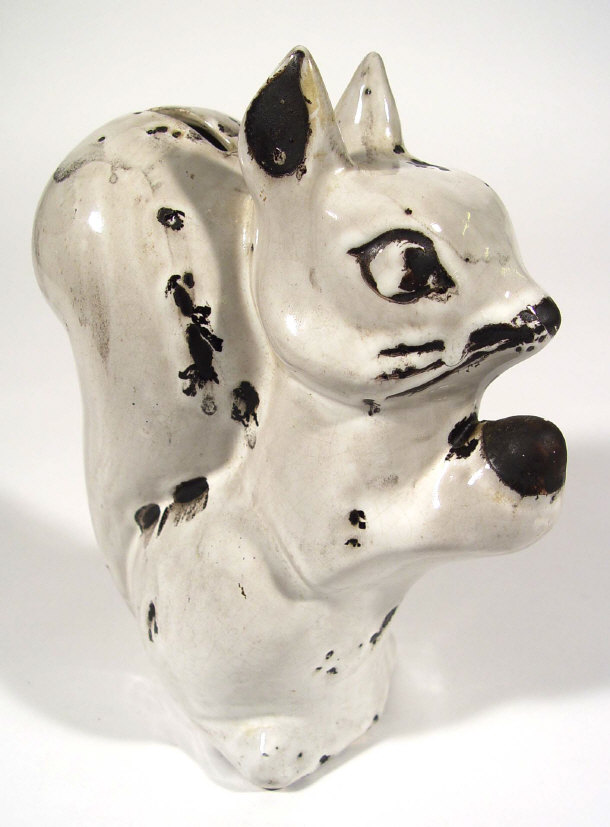 Appraisal: David Sharp Rye pottery squirrel money bank painted marks to