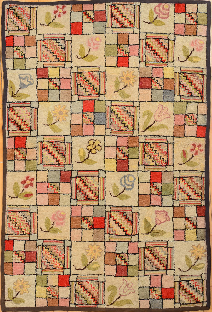 Appraisal: AMERICAN HOOKED RUG Worked with alternating squares of flowers diagonal