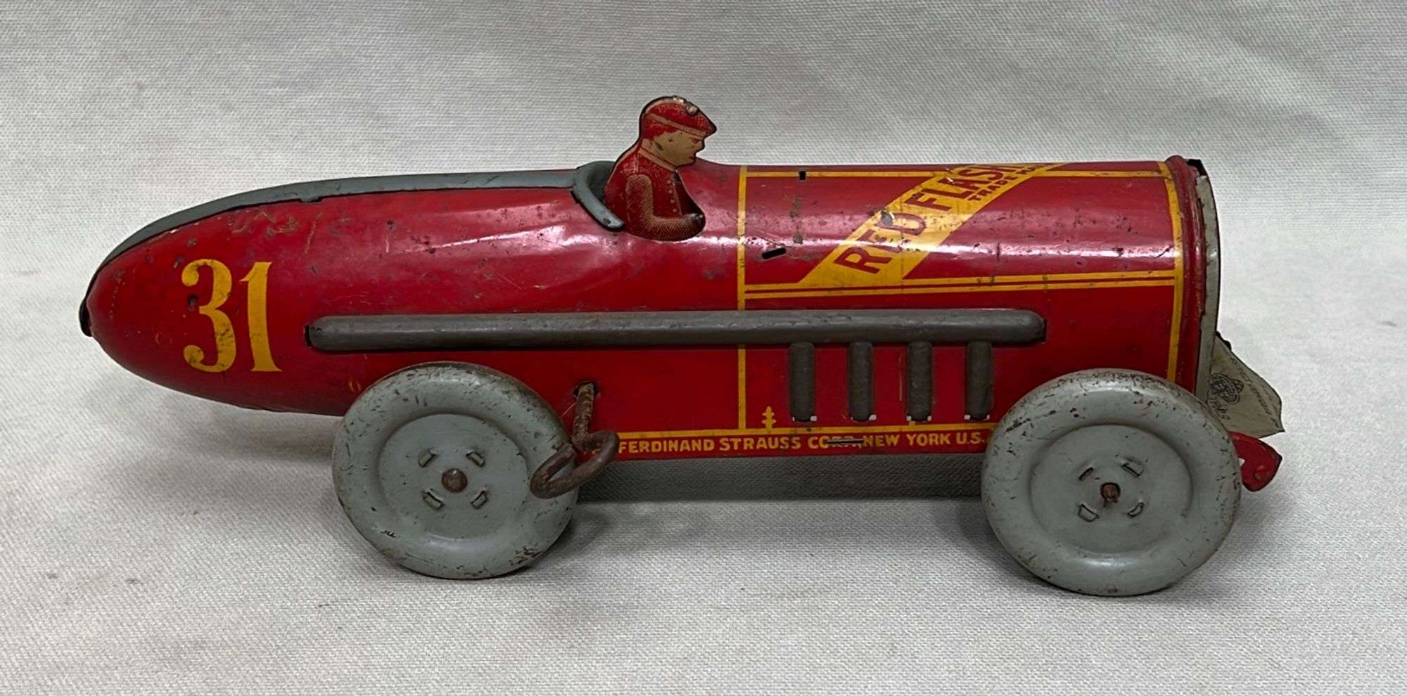 Appraisal: Ferdinand Strauss Red Flash Racer tin wind-up toyearly th century