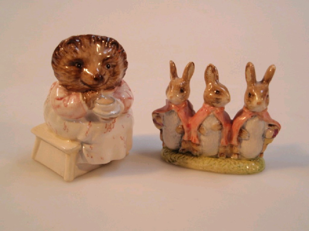 Appraisal: A Beswick Beatrix Potter Mrs Tiggy Winkle cm high together