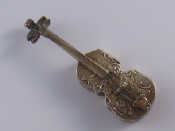 Appraisal: A silver pill box in the shape of a violin