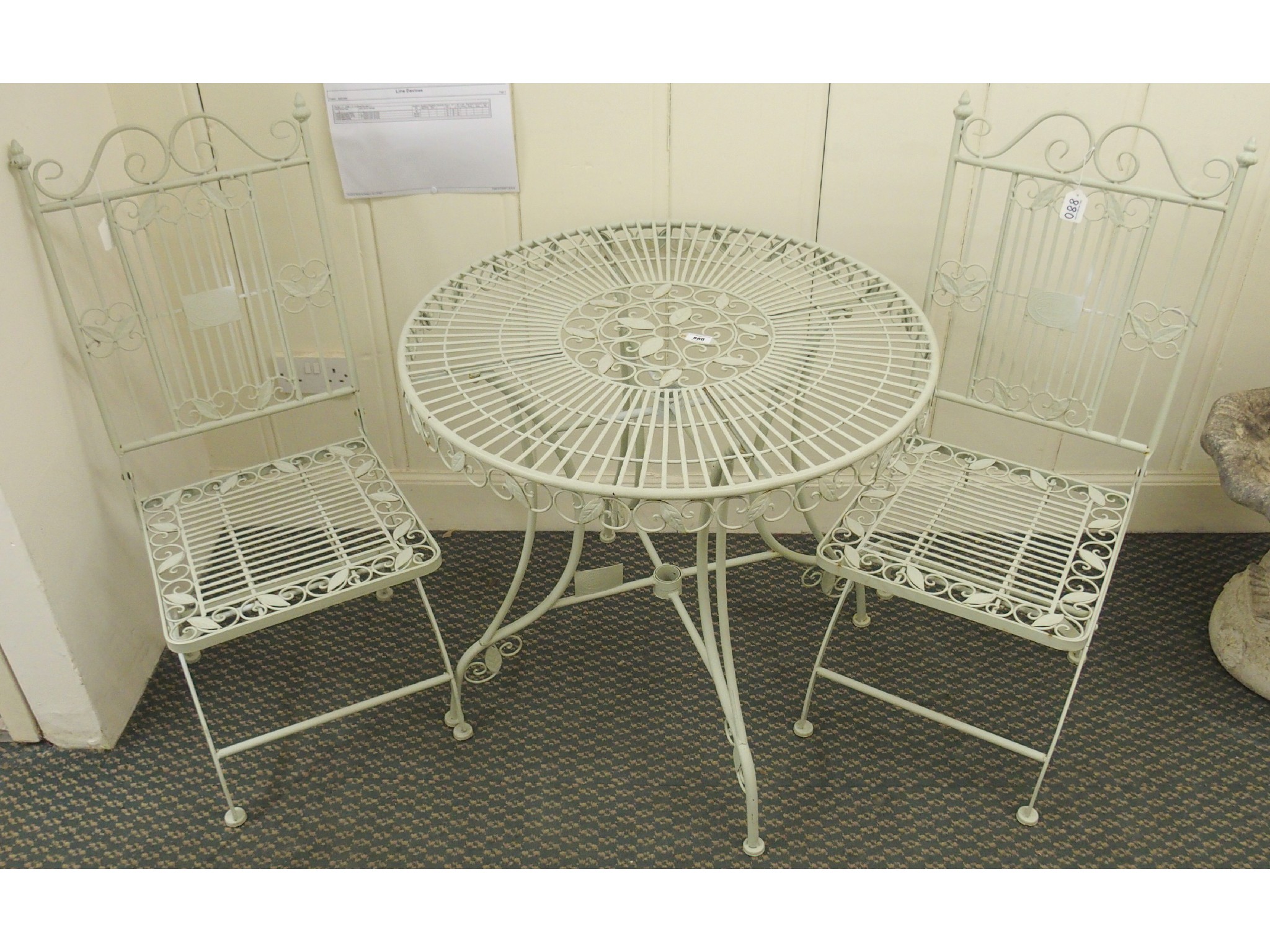 Appraisal: A modern round metal garden table and two folding chairs