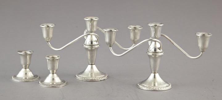 Appraisal: Four-Piece Group of Sterling Silver Candle Holders second quarter th