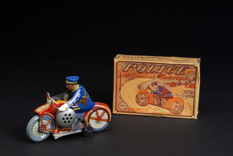 Appraisal: Tin Marx Police Motorcycle Wind-Up Toy Description American Working Minor