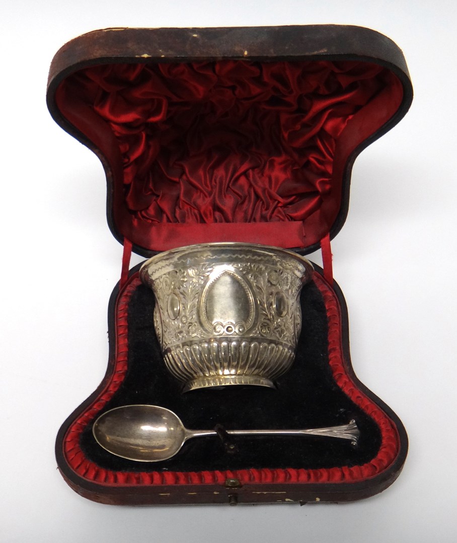 Appraisal: A Victorian silver christening bowl with floral embossed and partly