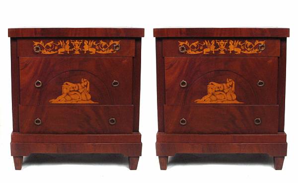 Appraisal: A pair of Danish style inlaid three drawer commodes height