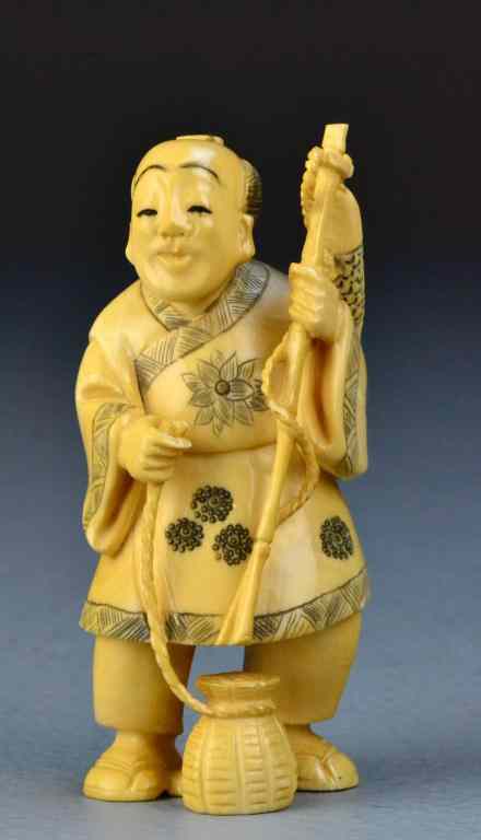 Appraisal: Japanese Carved Ivory Okimono Of A FishermanFinely carved to depict