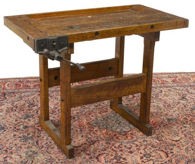 Appraisal: Rustic craftsman's workbench in a weathered finish having rectangular top