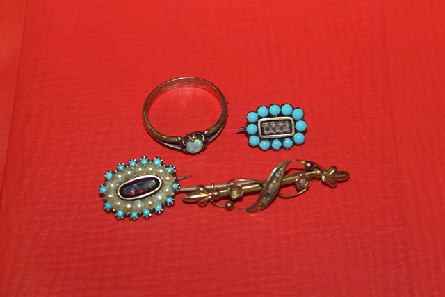 Appraisal: A VICTORIAN BAR BROOCH a gold ring with opal setting