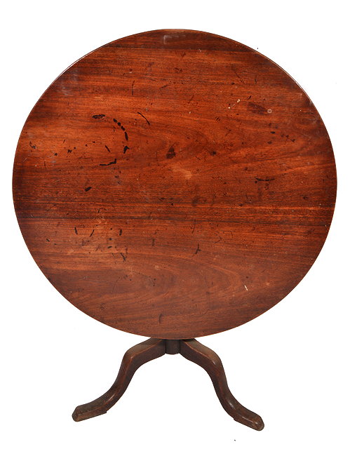 Appraisal: A GEORGE III CIRCULAR TILT TOP MAHOGANY OCCASIONAL TABLE on